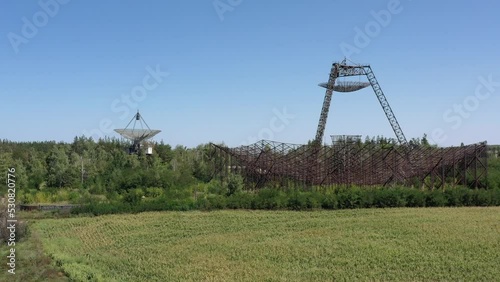 Abandoned station for studying the ionosphere. Zmiiv, Kharkiv Oblast, Ukraine. Aerial. Summer. Institute of the Ionosphere. Plate reflector of the station. photo