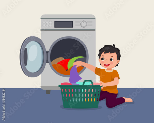 cute little boy doing laundry with washing machine helping mom as daily routine chores activity