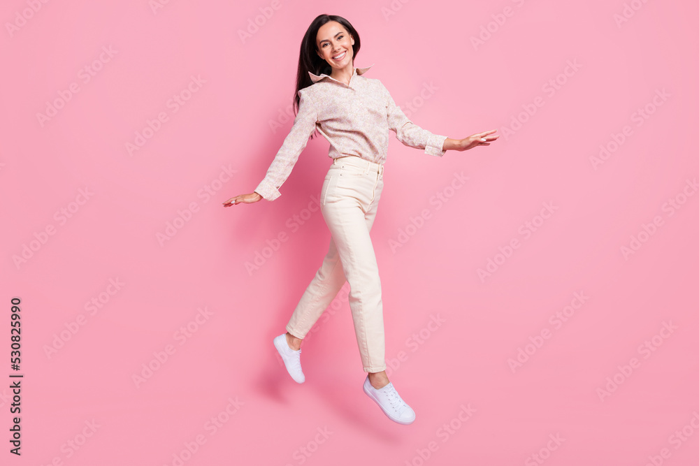 Full length photo of pretty lady jumping up feeling good mood isolated on pastel color background