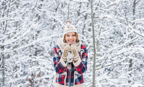 joyful and energetic woman. skiing holiday on winter day. beautiful woman in warm clothing. Enjoying nature wintertime. Portrait of excited woman in winter. Cheerful girl outdoors
