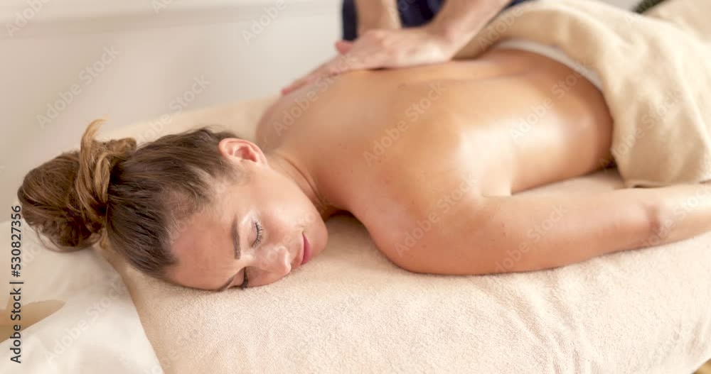 Woman Enjoying Massage In Spa Beauty Centre Woman Enjoying Massage In Spa Beauty Centre