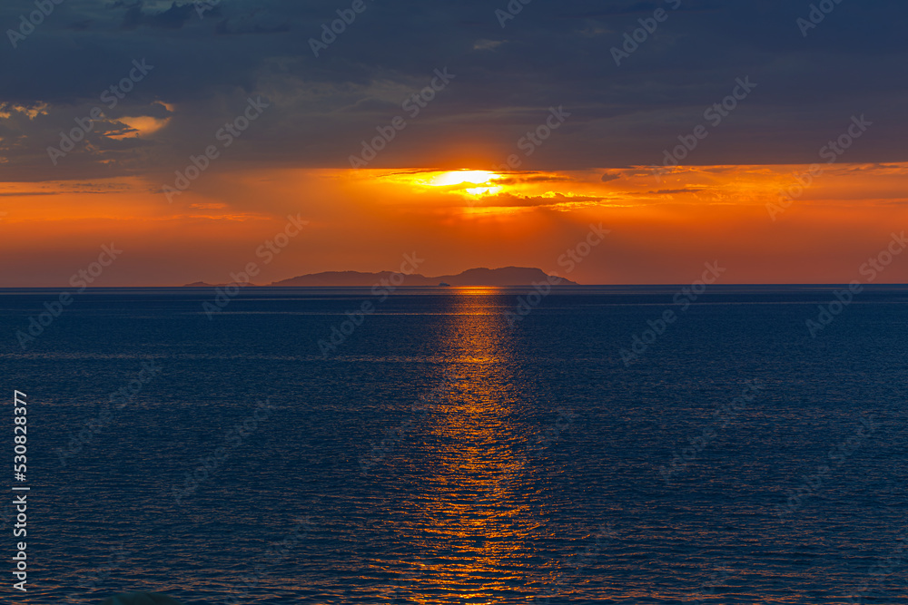 Sunset from the beach in Acharavi, Corfu island