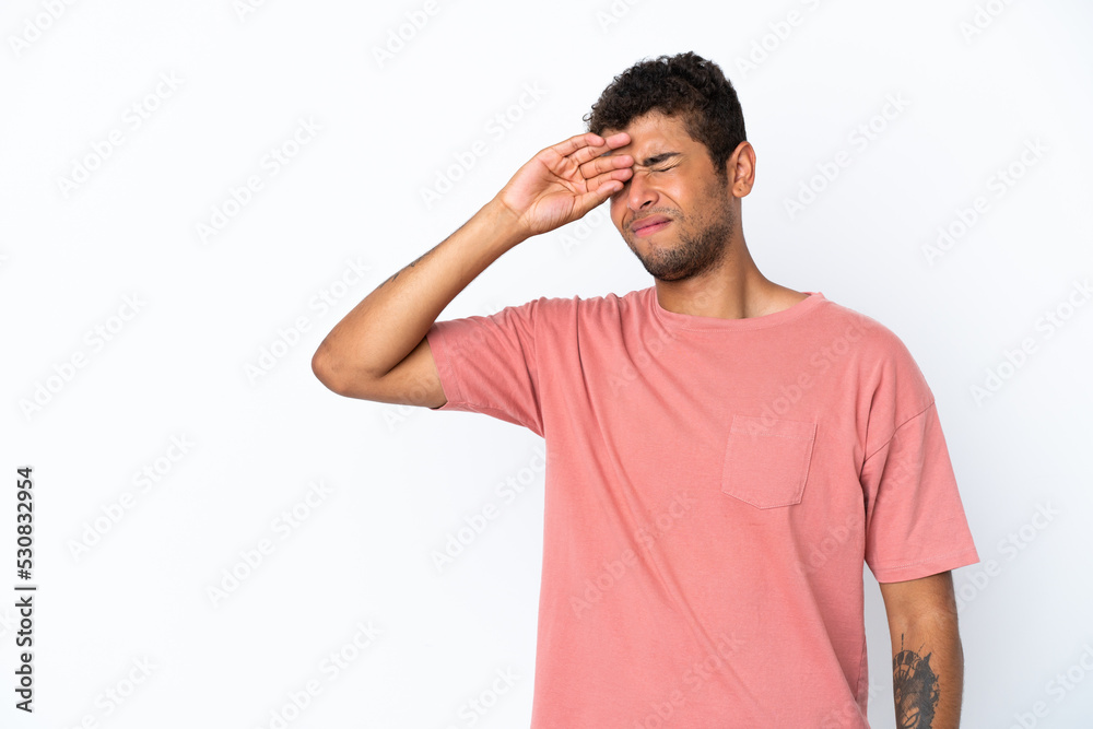 Young handsome Brazilian man isolated on white background with tired and sick expression Young handsome Brazilian man isolated on white background with tired and sick expression
