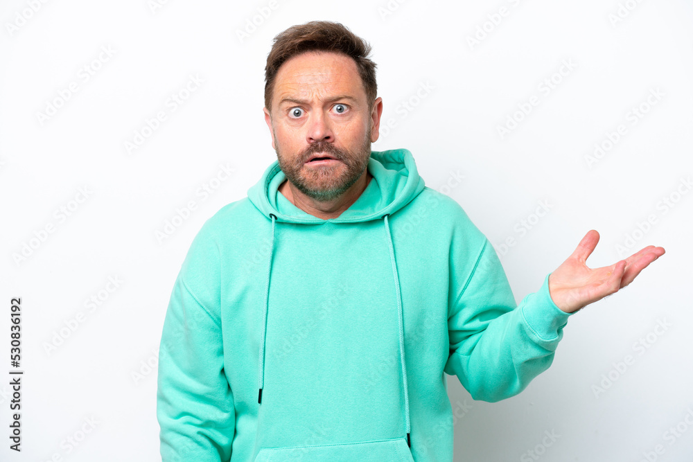 Middle age caucasian man isolated on white background making doubts gesture Middle age caucasian man isolated on white background making doubts gesture