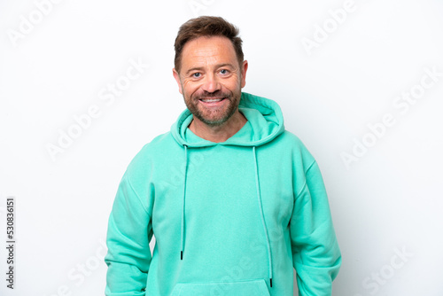 Middle age caucasian man isolated on white background laughing © luismolinero