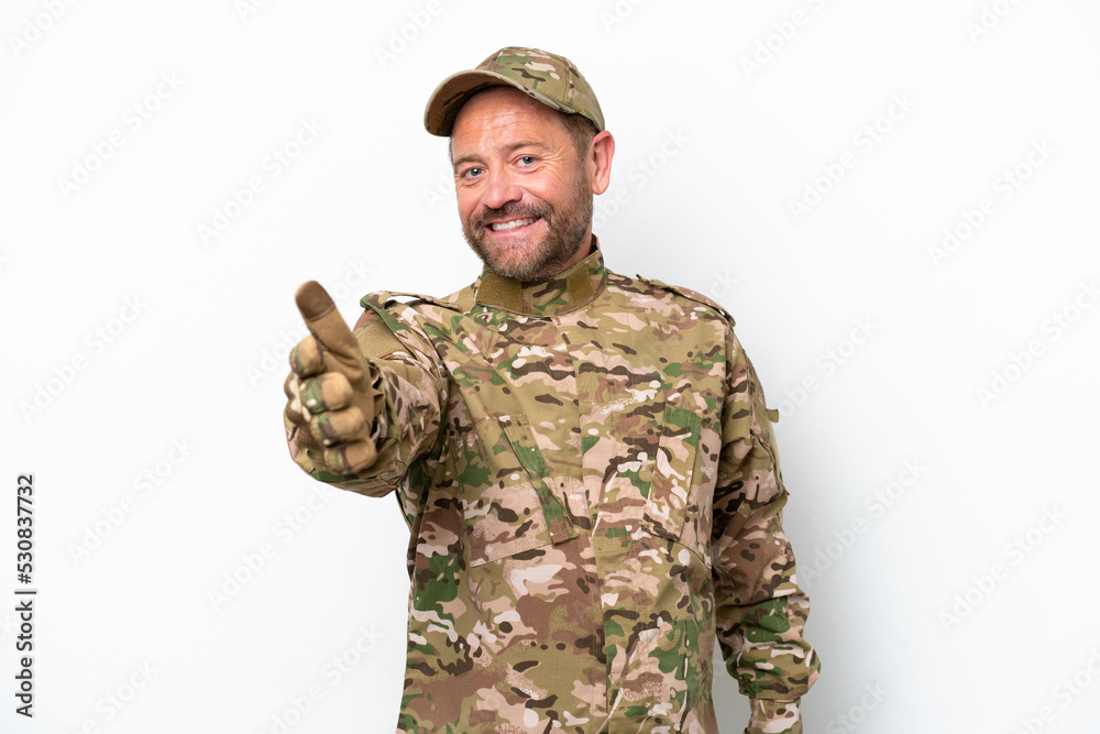 Military man isolated on white background shaking hands for closing a good deal Military man isolated on white background shaking hands for closing a good deal