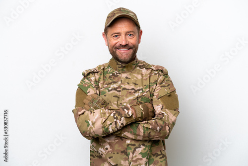 Military man isolated on white background keeping the arms crossed in frontal position