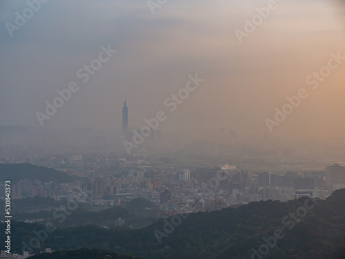 Sunset aerial view of the Neihu District cityscape from Bishanyan