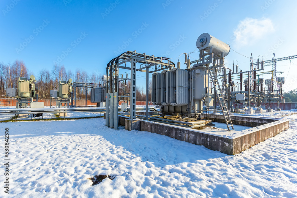 Obraz premium Electrical transformer, equipment for stepping up or stepping down voltage, high voltage power plant