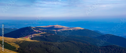 Landscape of the Ranca resort - Romania seen from a distance photo