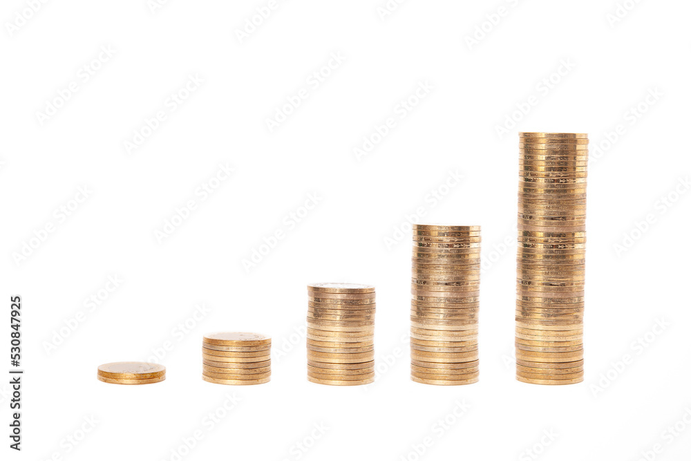 Close-up of coins stack on white background. Close-up of coins stack on white background.
