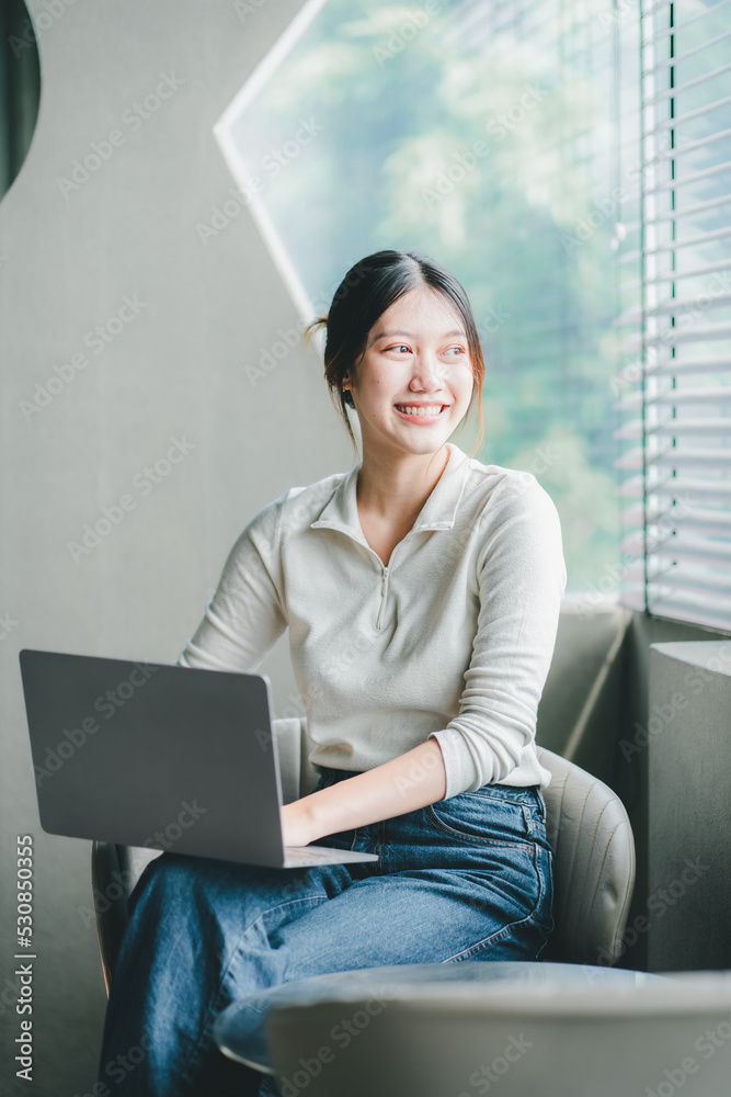 Attractive and happy young female Asian student studying online, sitting at desk, using laptop computer, having video chat, waving, education concept. Attractive and happy young female Asian student studying online, sitting at desk, using laptop computer, having video chat, waving, education concept.