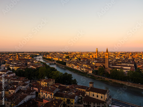 sunrise in the old town of verona, italy with beautiful golden colors © Grzybowski