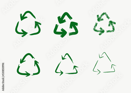 Hand drawn recycle symbol, brush strokes, vector, isolated.