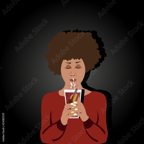 A creative cut out advertising banner with a person holding a glass of hot mulled wine with slices of orange, anise stars and cinnamon sticks. An African-American girl with mulled wine in her hands.