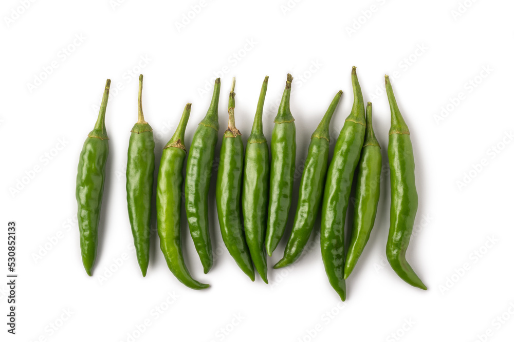 bunch of green chillies isolated on white background, common vegetable used for their spicy taste bunch of green chillies isolated on white background, common vegetable used for their spicy taste