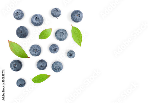 Scattered ripe great blueberry with leaves isolated on white background top view 