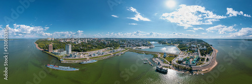 High resolution stitched panorama of a scenic aerial view of Cheboksary, capital city of Chuvashia, Russia and a port on the Volga River on sunny summer day. photo