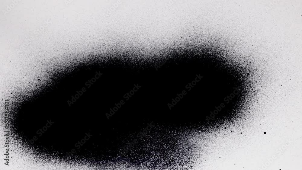 Black spray paint on a white background. Overlay.