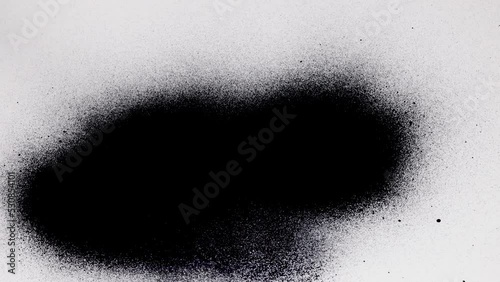 Black spray paint on a white background. Overlay.