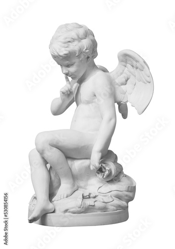 Cupid statue decorated. Angel sculpture on white background with clipping path photo