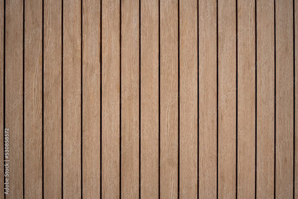 Arranged pattern brown wooden planks board background makes you feel warm and natural. Arranged pattern brown wooden planks board background makes you feel warm and natural.