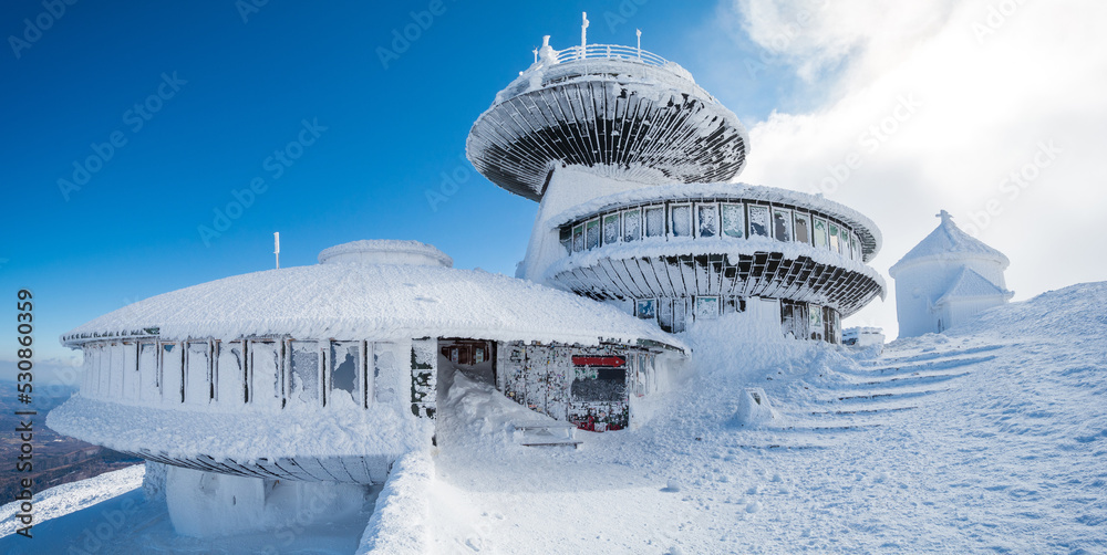 peak of sniezka mountain during winter in Giant mountains in Poland