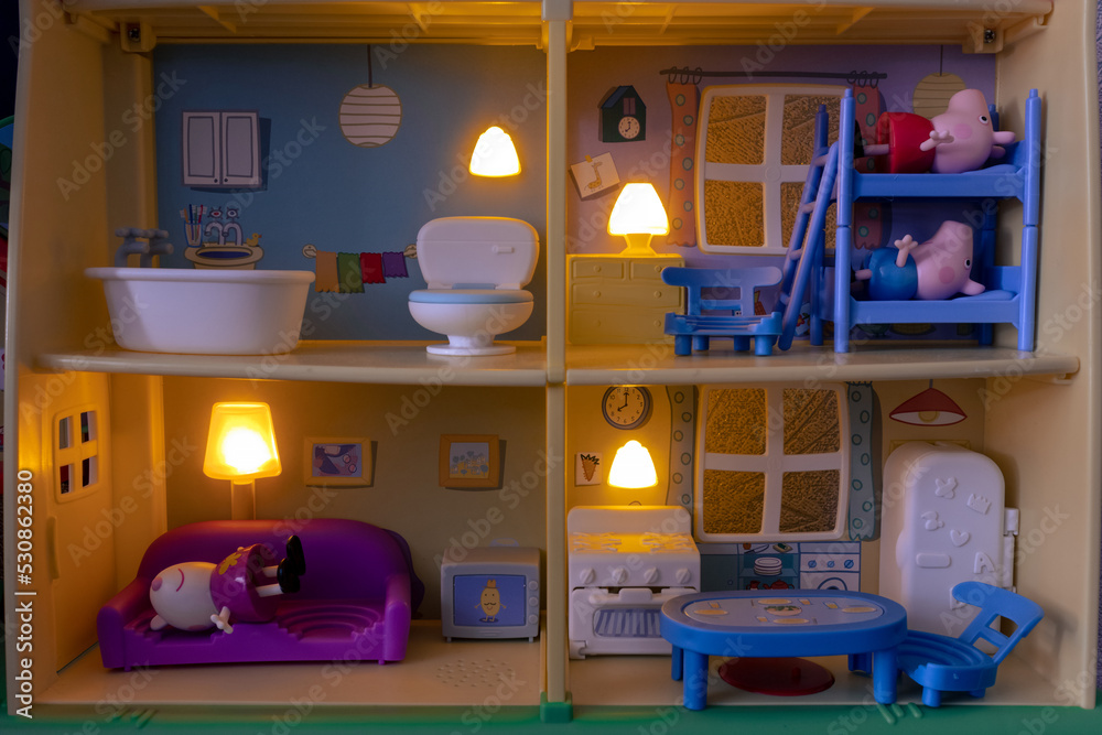 Peppa Pig's toy house. Peppa Pig, George and Suzy Sheep sleep in a