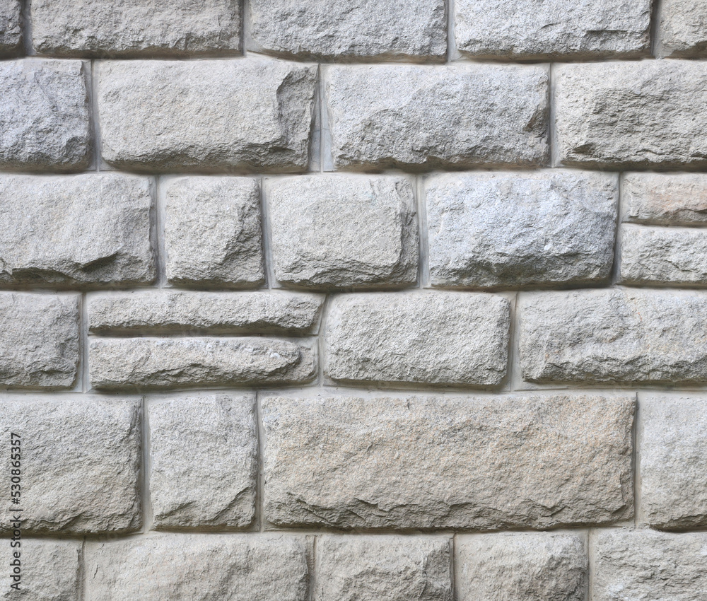 Fototapeta premium Granite tiles natural stone wall background