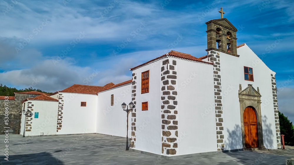 Scenic view on historic San Pedro church in the town centre of tourist village Vilaflor, Tenerife, Canary Islands, Spain, Europe. Cathedral of St Peter the Apostle. Scenic view on historic San Pedro church in the town centre of tourist village Vilaflor, Tenerife, Canary Islands, Spain, Europe. Cathedral of St Peter the Apostle.