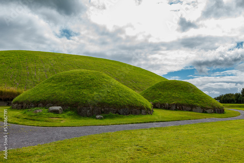 The megalithic tombs of Newgrange in Ireland photo