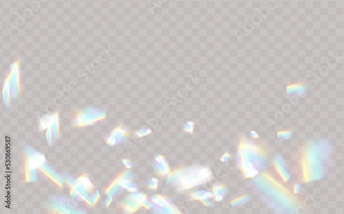 Rainbow highlights on a black background.Glare or reflection from water and glass.Glittering particles for social media backgrounds, product presentations, photo shots.