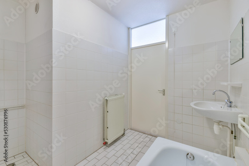 Interior of light spacious bathroom