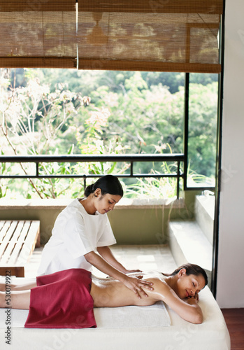 Woman Receiving Ayurvedic Massage at a Spa, Dambulla, Sri Lanka.