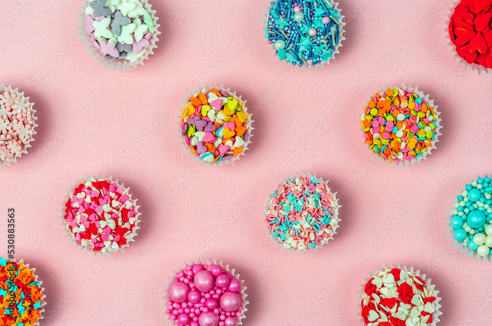 Fototapeta premium Patter from confectionery decor, the sweetest day. Abstract background. Bright background.