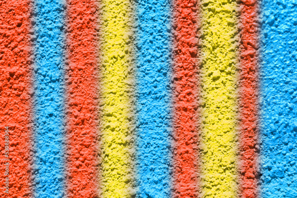 rainbow colored rough abrasive surface texture closeup photo
