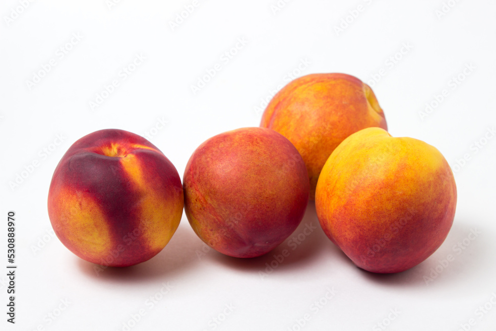 Nectarine isolated on white background. Ripe and tasty fruits Nectarine isolated on white background. Ripe and tasty fruits