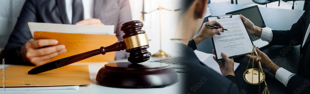 Judge gavel with Justice lawyers having team meeting at law firm in background. Concepts of law. Judge gavel with Justice lawyers having team meeting at law firm in background. Concepts of law.