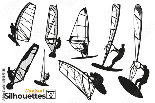 Isolated group of windsurfing silhouettes. photo