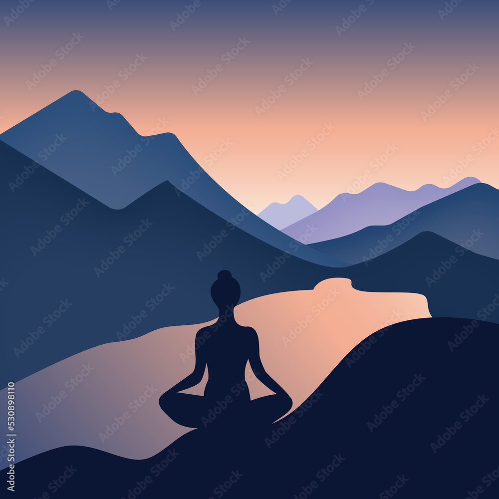 Silhouette of a woman meditating in the mountains at sunrise