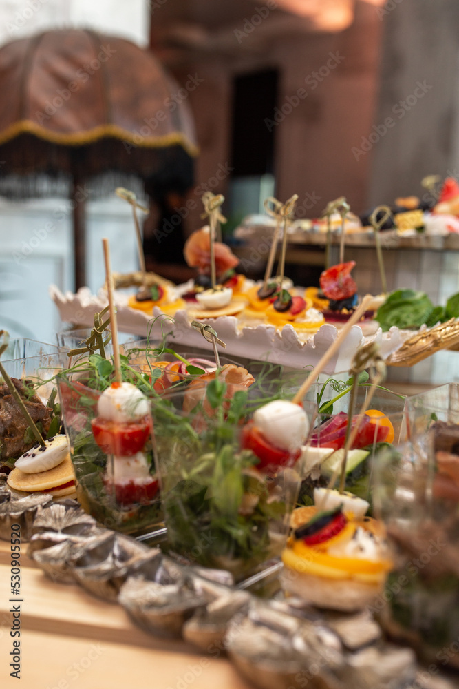 various snacks and drinks on the table at the event