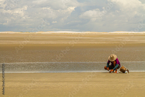 men doing artisanal fishing in Lençóis Maranhenses, Brazil