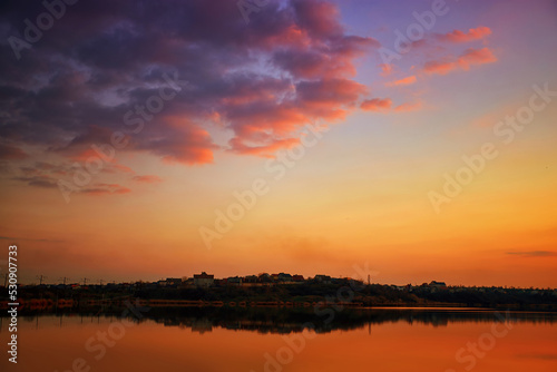 Fototapeta Naklejka Na Ścianę i Meble -  Sunset on the lake with reflection