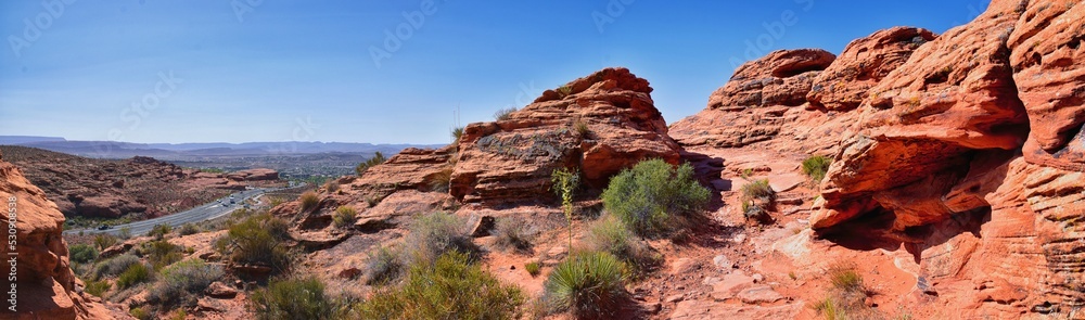 Saint George hiking trail Owen’s Loop via Brooks Nature Trail views of sandstone mountains and desert plants around the Red Cliffs National Conservation Areas in southwest Utah, by Zion’s National Par