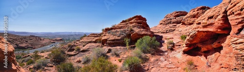 Saint George hiking trail Owen’s Loop via Brooks Nature Trail views of sandstone mountains and desert plants around the Red Cliffs National Conservation Areas in southwest Utah, by Zion’s National Par