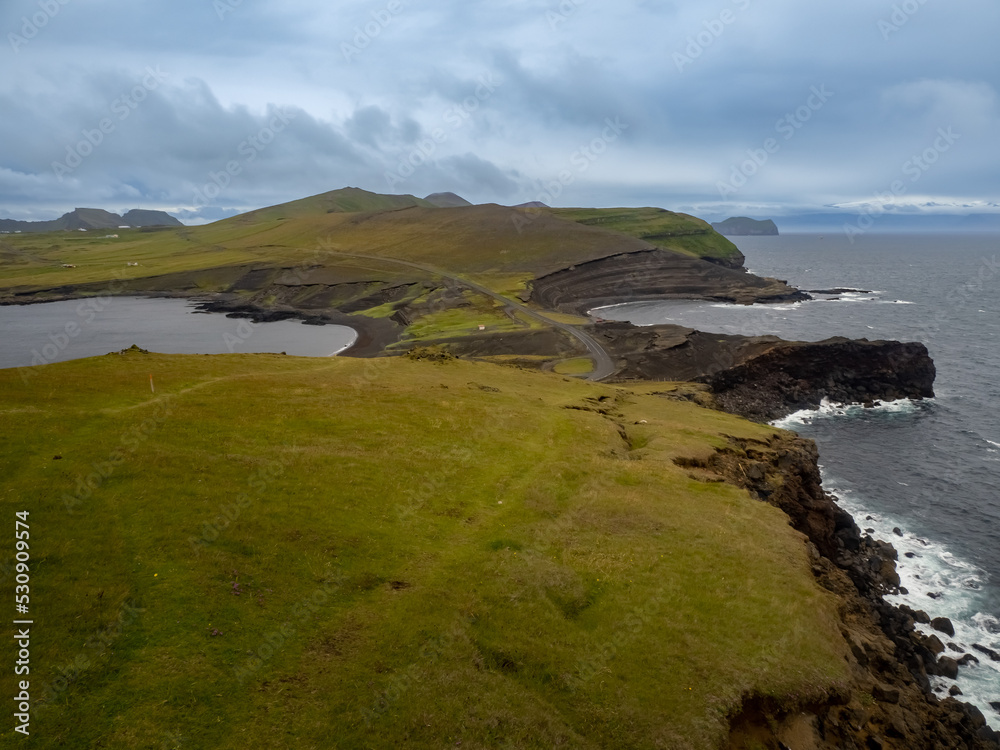 Obraz premium View of Heimaey island from Storhofdi, Vestmannaeyjar (Westman Islands) off the south coast of Iceland.