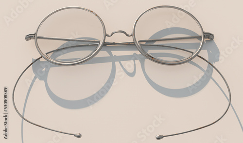 Round vintage glasses with thin metal frames and clear lenses.