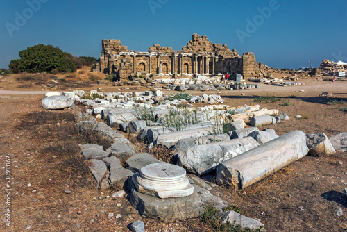 View of the ruins of the monumental ancient Roman Agora with marble columns in the historic part of Antique Side, in Antalya, Turkey
