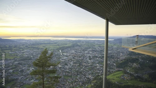 View from Karren onto the Town of Dornbirn in the Rhein Valley in Vorarlberg, Austria, toward Lake of Constance during sunset. Timelapse Video