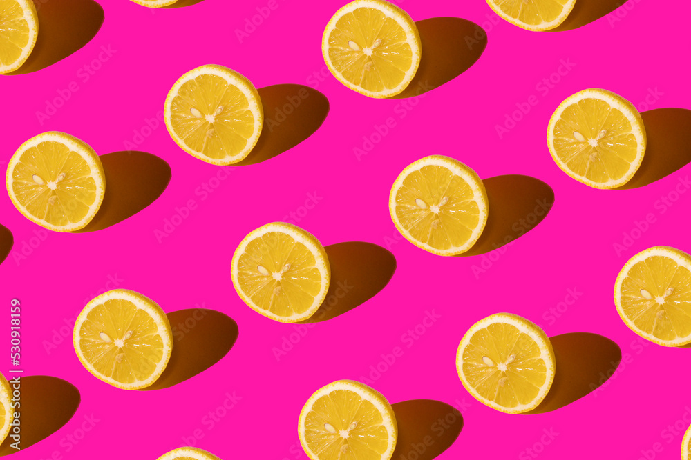 Lemon pattern on a pink background. Pop art design, creative citruses. Yellow lemon, minimal flat style.